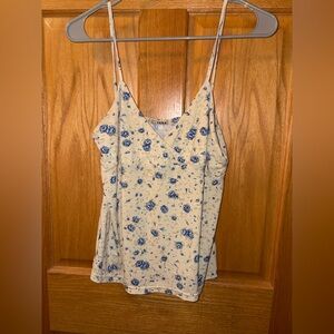 Cream tank top with blue flower design